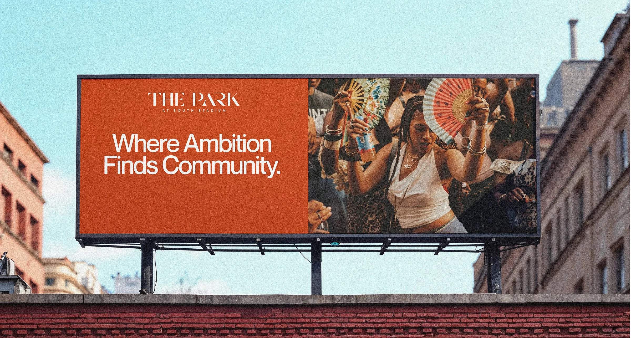 The Park at South Stadium billboard reading Where ambition finds community